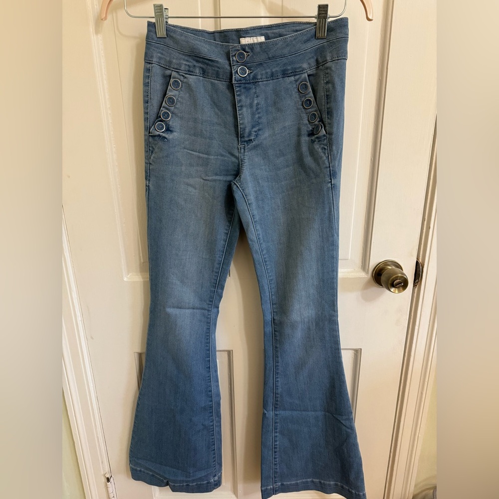 Celebrity Pink medium wash flare jeans with buttons
Size 27